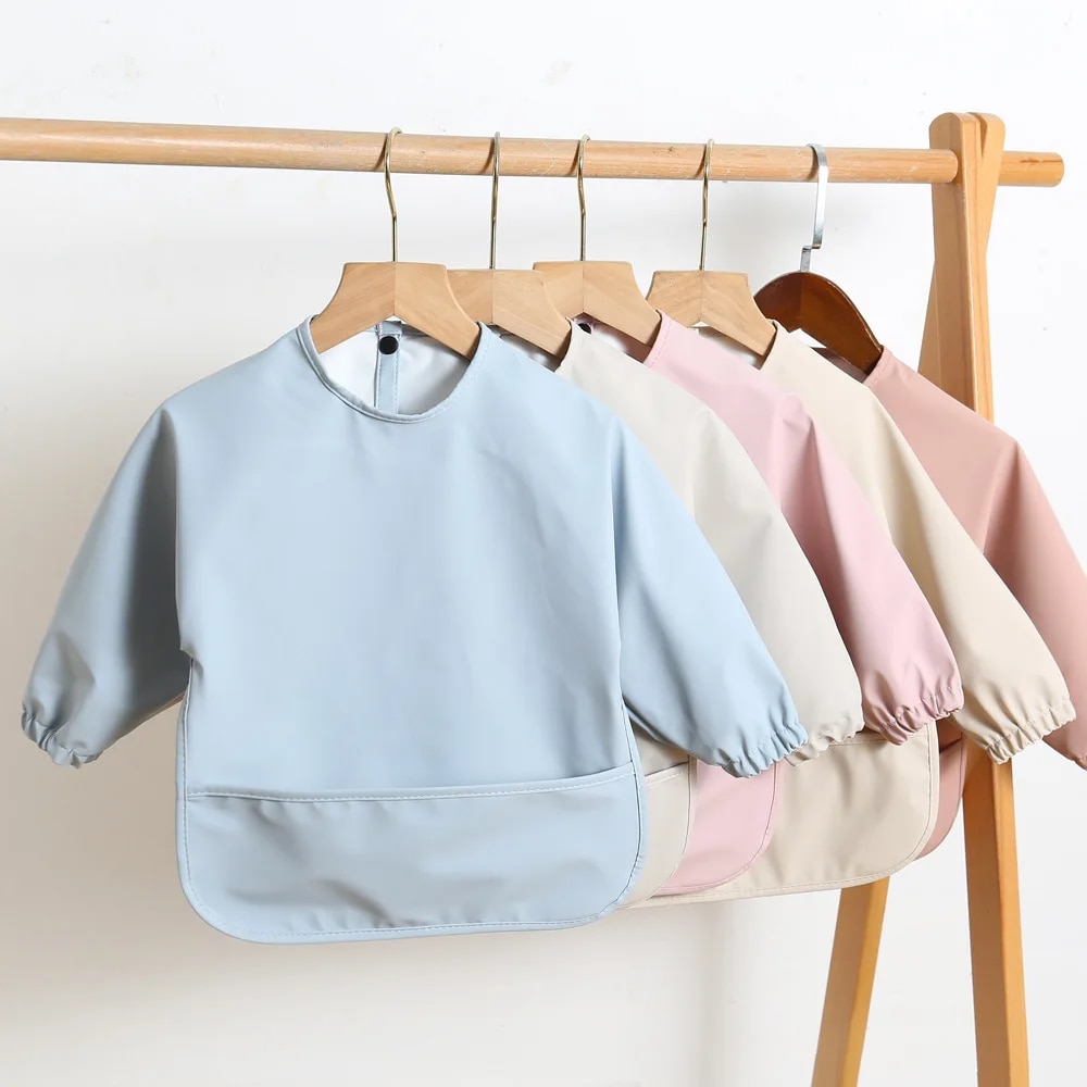 مرايل تغذية الأطفال بلون سادة  - مراجعة Baby Food Apron وسعره